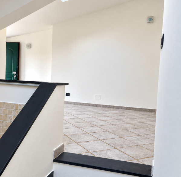 Ingresso moderno con scala e lucernario
